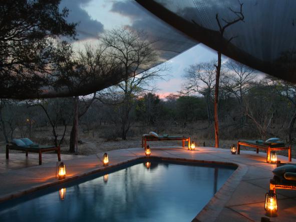 Selous Safari Camp - pool at night